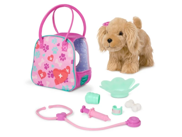 Kokeršpaniel v kabelke s veterinárskou sadou